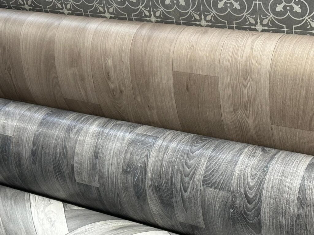 Well-crafted vinyl flooring displaying realistic patterns, smooth finish, and durable surface quality